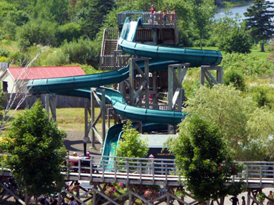 Whirl and twirl down 230 feet of wet water slide fun!